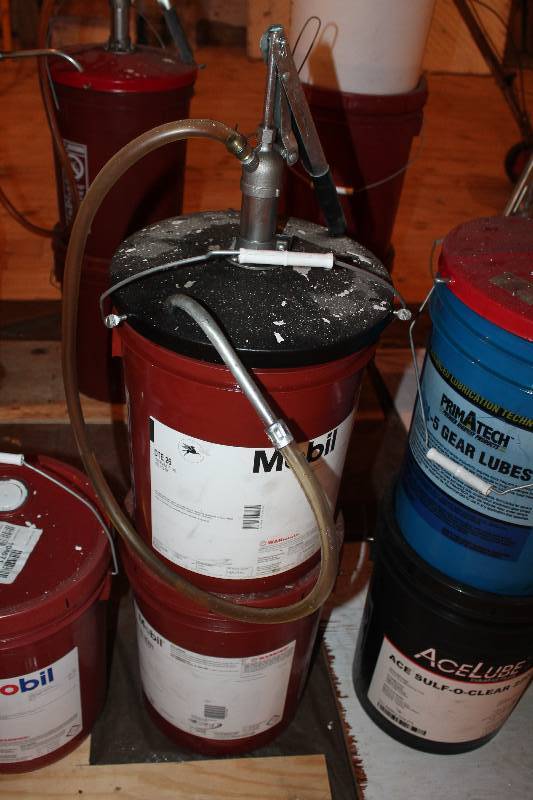 lot 374 image: Lot of (2) 5-gallon pails. One unopened, one opened with pump. Mobil DTE Hydraulic oil