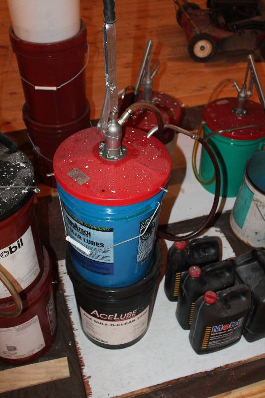 lot 375 image: Lot of (2) 5-gallon pales. First, Primatech Gear lube 80W-90, opened with pump. Second, ACE sulf-o-clear 2200 machining fluid, New  unopened.