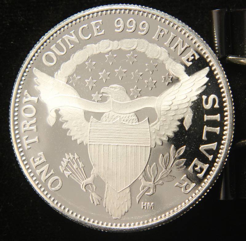 lot 10 image: 1 TROY OZ. .999 FINE SILVER 1964 KENNEDY DESIGN