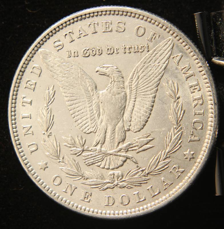 lot 47 image: 1885 MORGAN SILVER DOLLAR IN HIGH GRADE