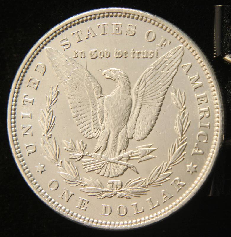 lot 54 image: 1889 MORGAN SILVER DOLLAR IN HIGH GRADE