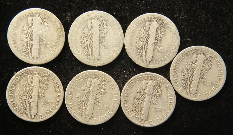 lot 79 image: 7 SILVER MERCURY DIMES AS PICTURED
