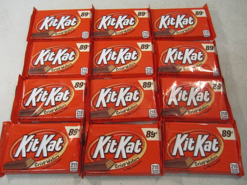 lot 253 image: 12 Kit Kat Candy Bars Best by Aug 2...