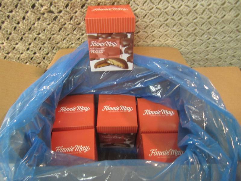 lot 297 image: Case of 6 Boxes Fannie May Milk Cho...
