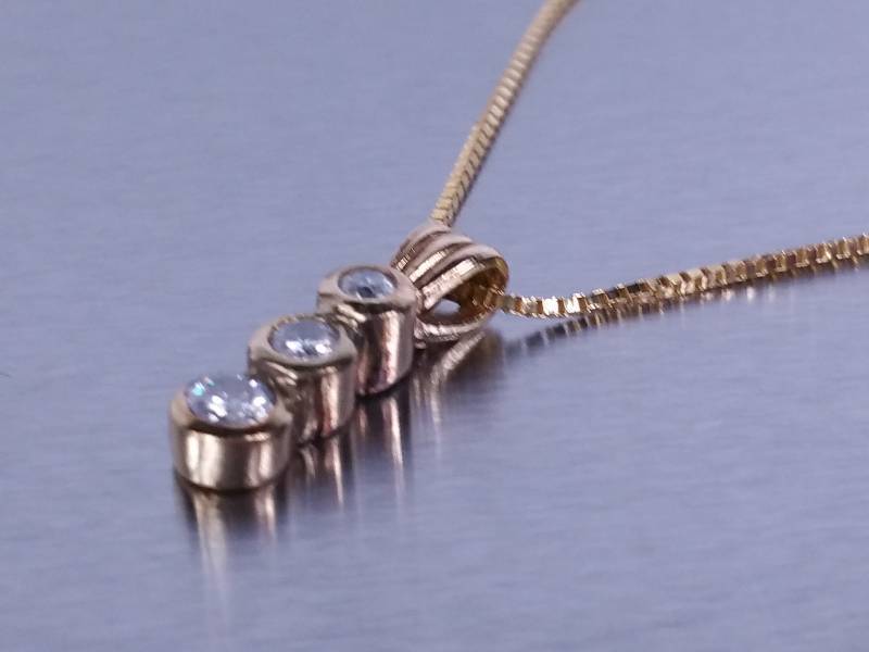 lot 34 image: Brilliant Past, Present, Future Diamond Neckalce & Chain 14k