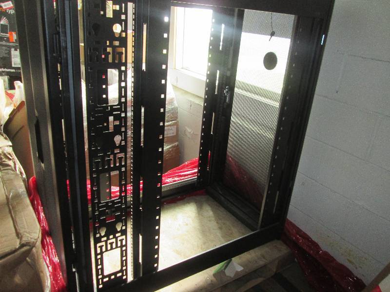 lot 100 image: APC rack on wheels...