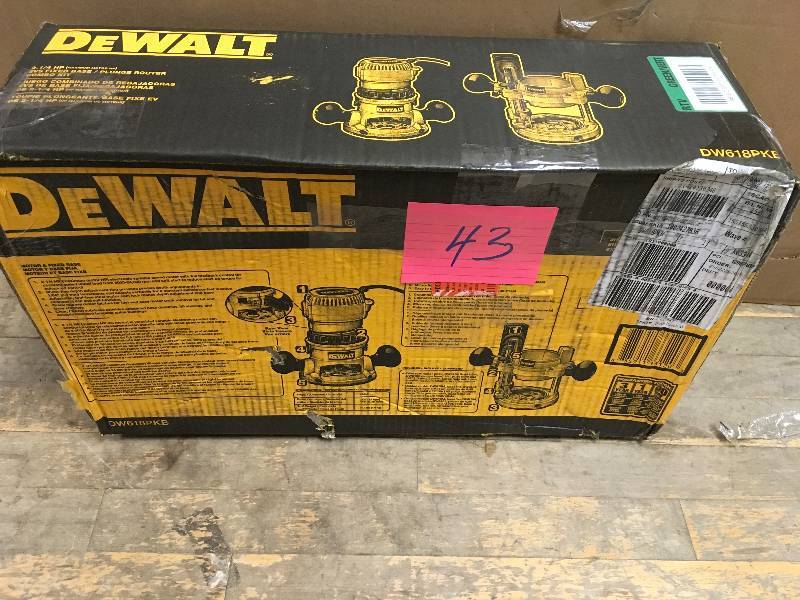 lot 43 image: Dewalt 12 Amp 2.25 HP Fixed and Plunge Base Corded Router Kit