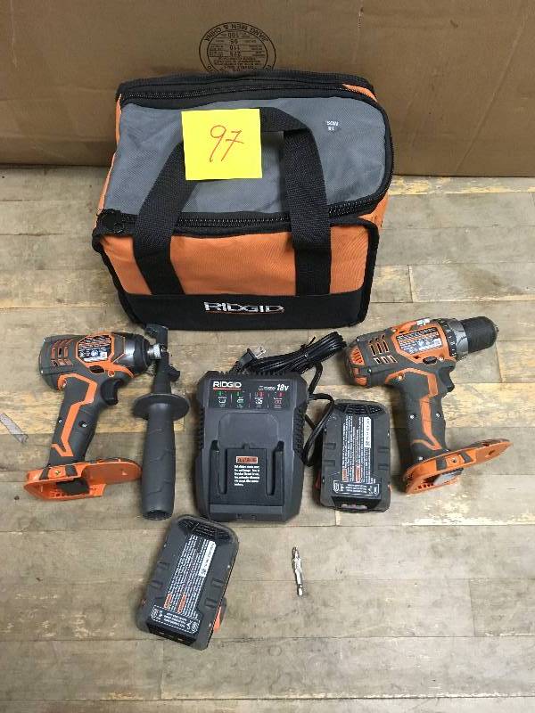 lot 97 image: RIDGID 18-Volt Lithium-Ion 12 in. Cordless Compact DrillDriver Kit 14  in Impact Driver plus bag  USED
