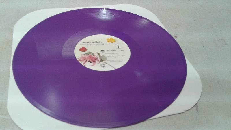 lot 2 image: Prince Purple Rain 12 Vinyl LP Record, Some Wear To Sleeve, Record Is In Good Condition