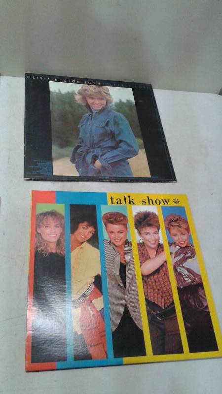 lot 22 image: Lot Of Four Vinyl LP Records, Two Gogos and Two Olivia Newton John, Sleeves May Show Wear, Records may Show Wear