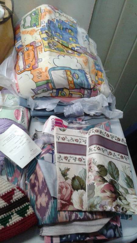 lot 98 image: Bin Filled With Knitting Items, Some Finished, Yarn, Fabrics