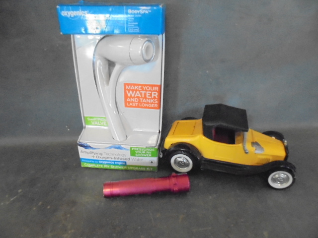 lot 25 image: RV Shower Head, Model Car and Flashlight