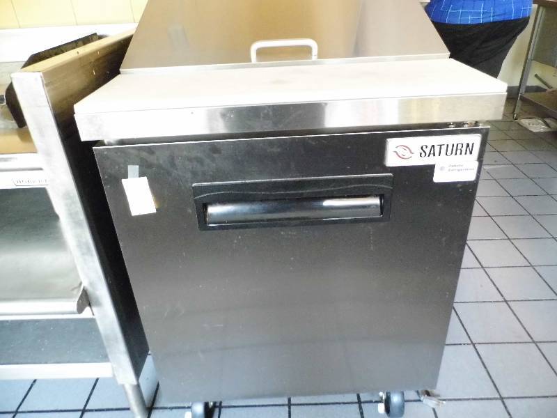lot 9 image: Saturn Refridgerator