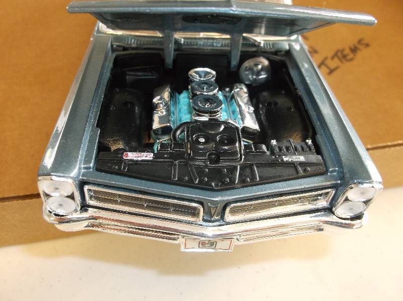 lot 15 image: 1965 GTO 116 scale toy car