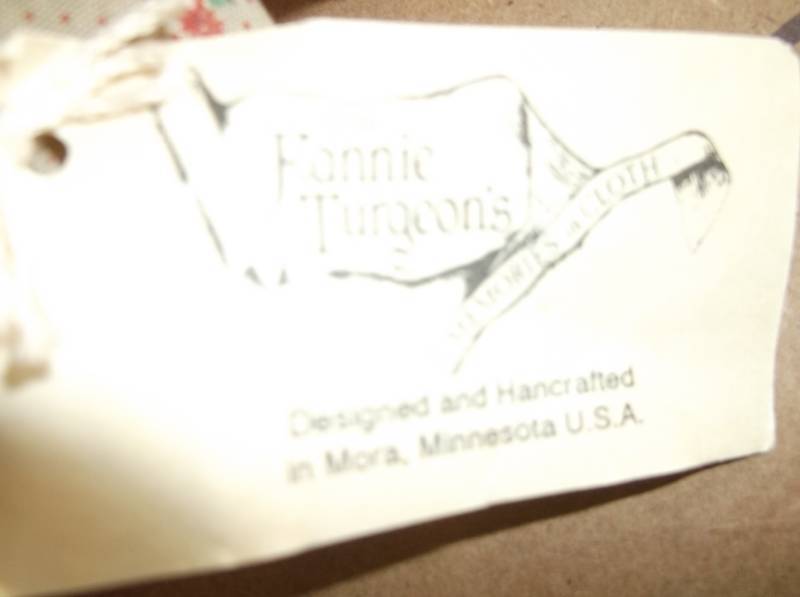 lot 19 image: Doll on stand