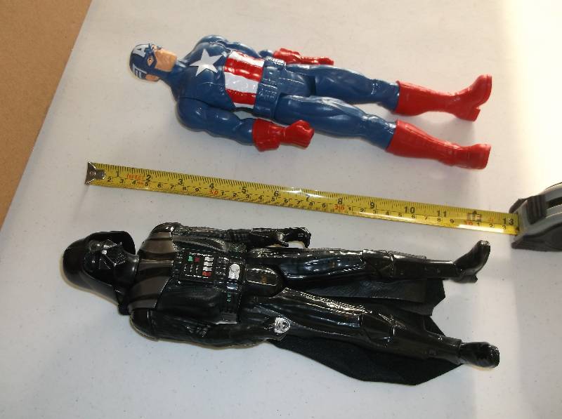 lot 30 image: Darth Vader and Captain America action figures