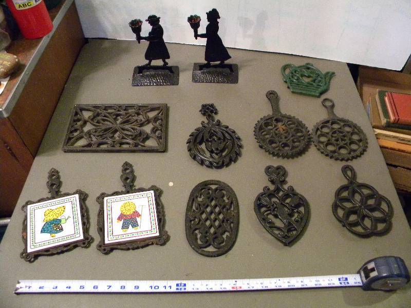 lot 67 image: Metal Trivets & 2 Candle Holders