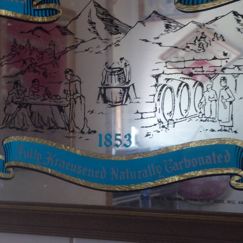 lot 32 image: Old Style Mirror Sign