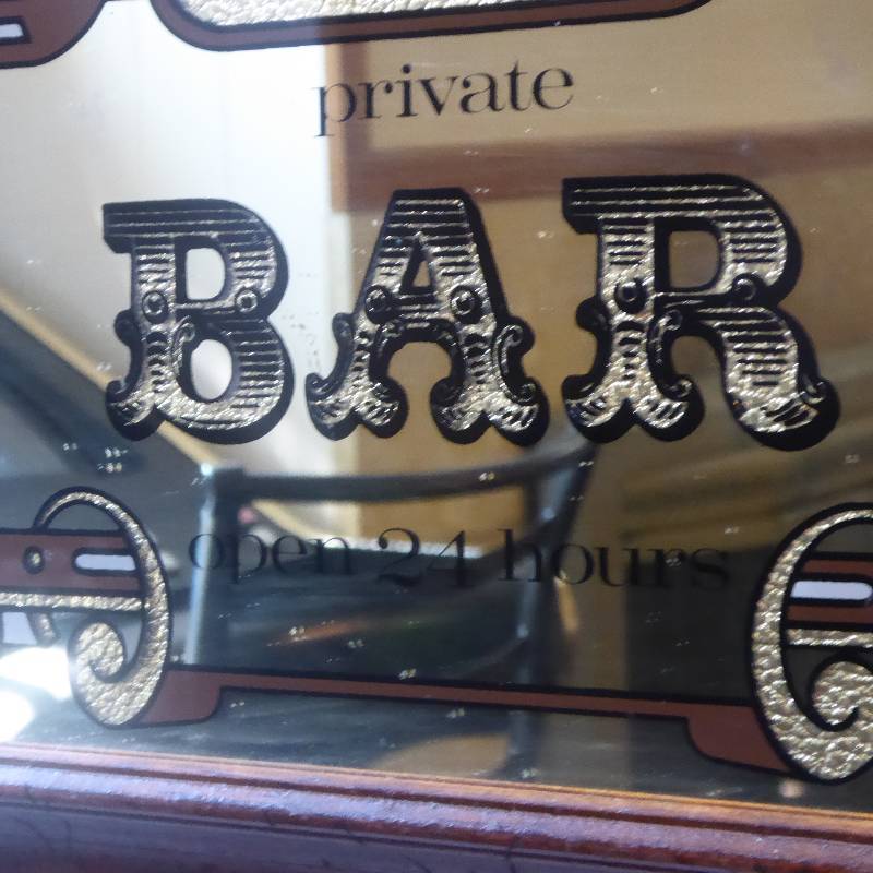 lot 55 image: Mirrored Bar Sign