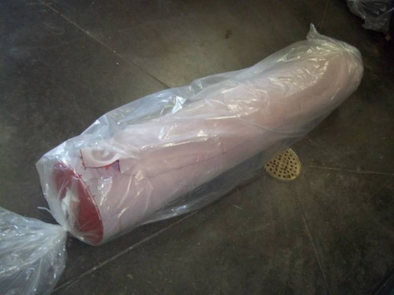 lot 89 image: Roll of Red Fabric  Yards