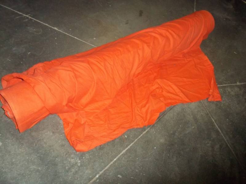 lot 91 image: Roll of Orange Fabric  Yards