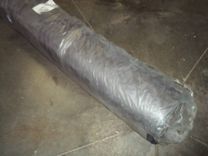 lot 102 image: Roll of Maroon Fabric 38.9 Yards
