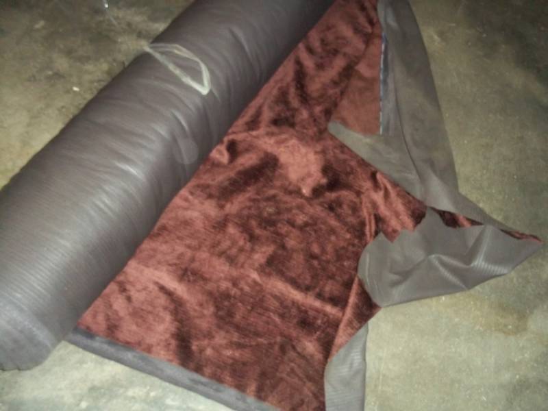 lot 105 image: Roll of Maroon Fabric  Yards