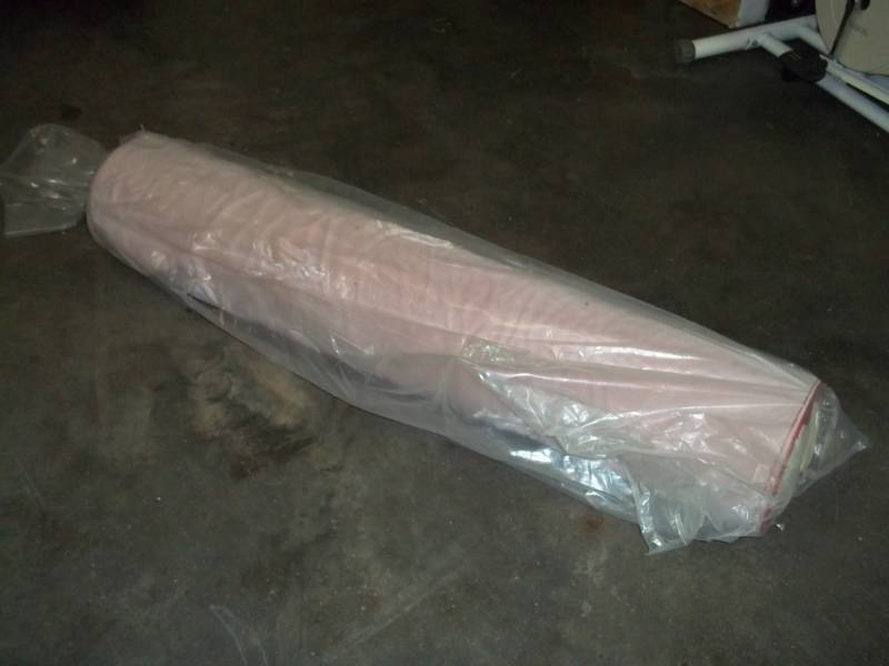 lot 109 image: Roll of Red Fabric 57 Yards