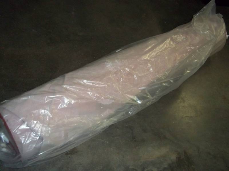 lot 111 image: Roll of Red Fabric 62.3 Yards