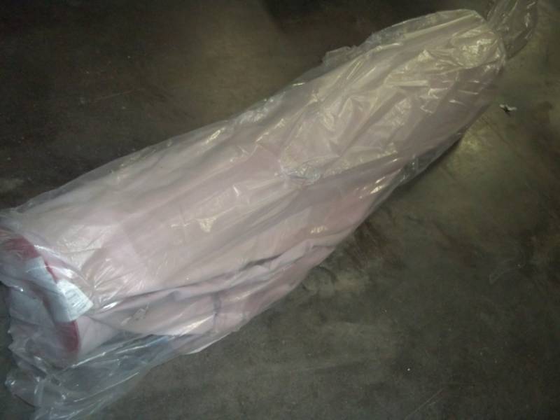 lot 114 image: Roll of Red Fabric 59 Yards