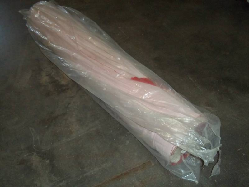 lot 115 image: Roll of Red Fabric 59 Yards