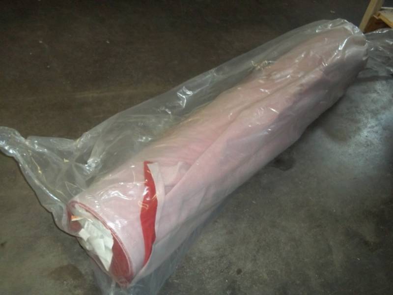 lot 117 image: Roll of Red Fabric 59.1 Yards