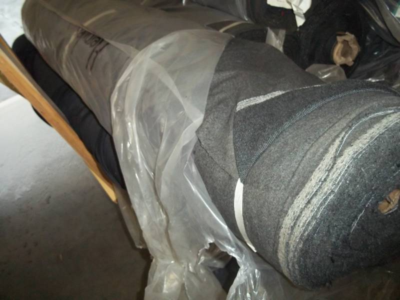 lot 150 image: Roll of Dark Gray Fabric  Yards