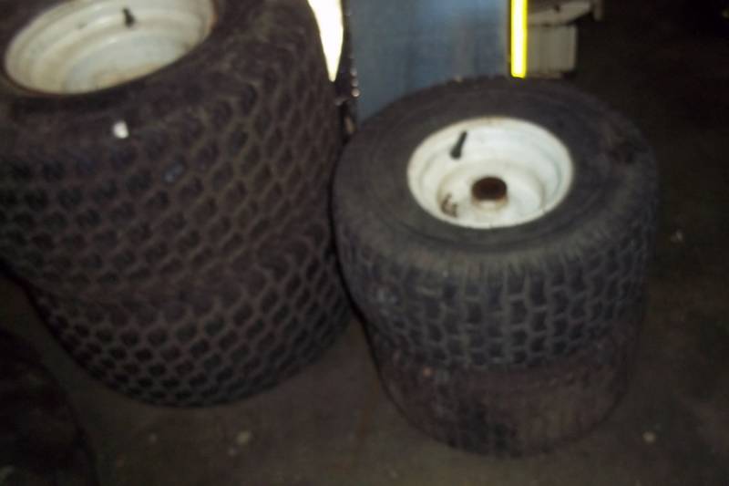 lot 252 image: Lawn Mower Tractor Tires and Wheels (2) 15 x 6.00 - 6 NHS and (2) 18 x 9.50 - 8 NHS