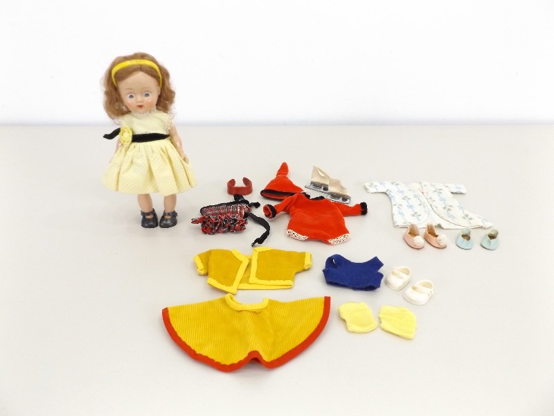 lot 47 image: Vintage Vogue Dolls Inc. Ginny Doll with Extra Outfits and Shoes