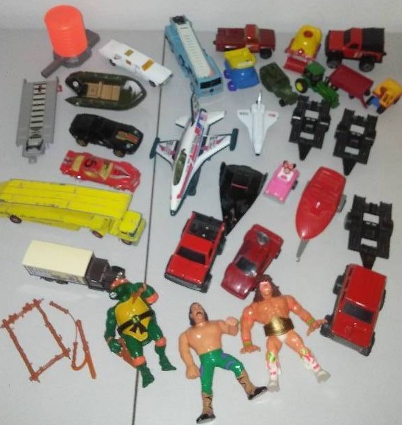 lot 217 image: Michelangelo, WWE, Tootsie cars, planes boats and Automobiles  more