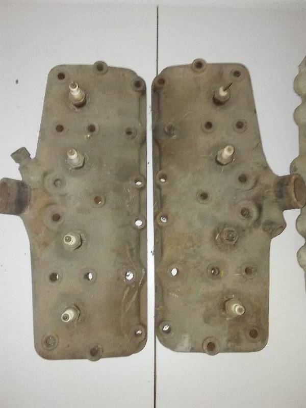 lot 276 image: Ford V8 circa 1940s heads, starter, alloy 2 Barrel manifold