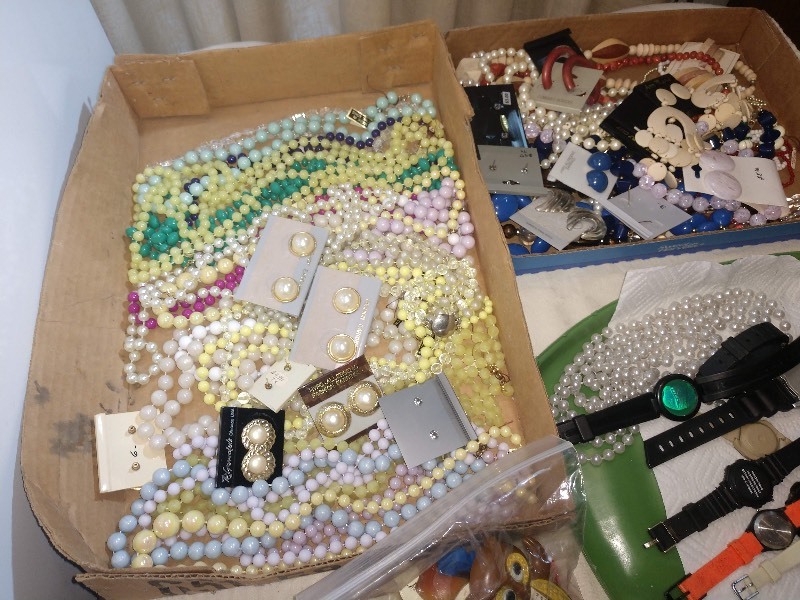 lot 60 image: Costume Jewelry, Wrist Watches, Refrigerator Magnets, Thermometer, and Very Cool Parrot Hair Brush Handles