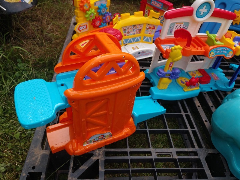 lot 71 image: VTech Speedway, VTech Hospital, VTech Amusement Park, Little Tykes Workhorse, Fisher Price Dino Baby Toys