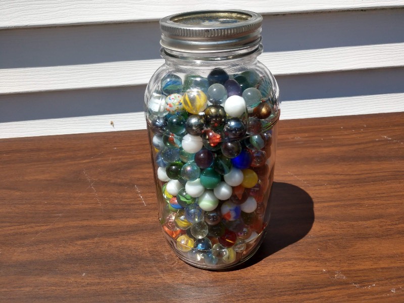 lot 145 image: Ball Mason Jar Featuring Marbles