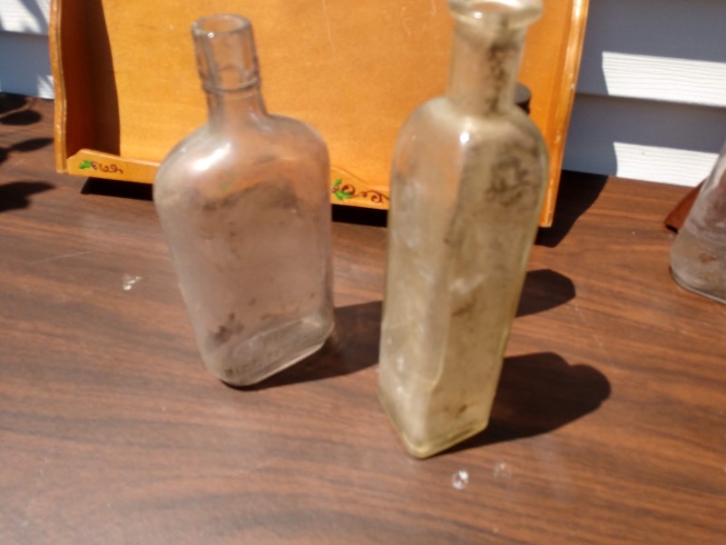 lot 119 image: Vintage Coca Cola Wood Display Shelf w Oval Cut Out, Glass Bottles and Glass Insulators
