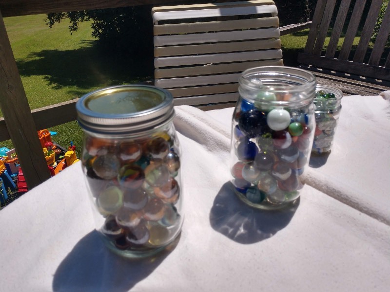 lot 122 image: Three Jars of Marbles