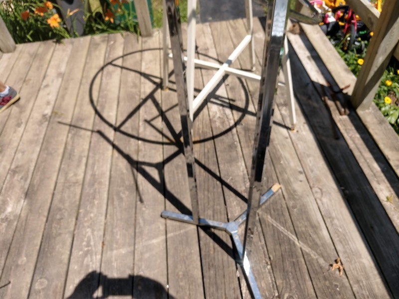 lot 45 image: Round Clothing Rack w Add-On Ring and Plant Stand