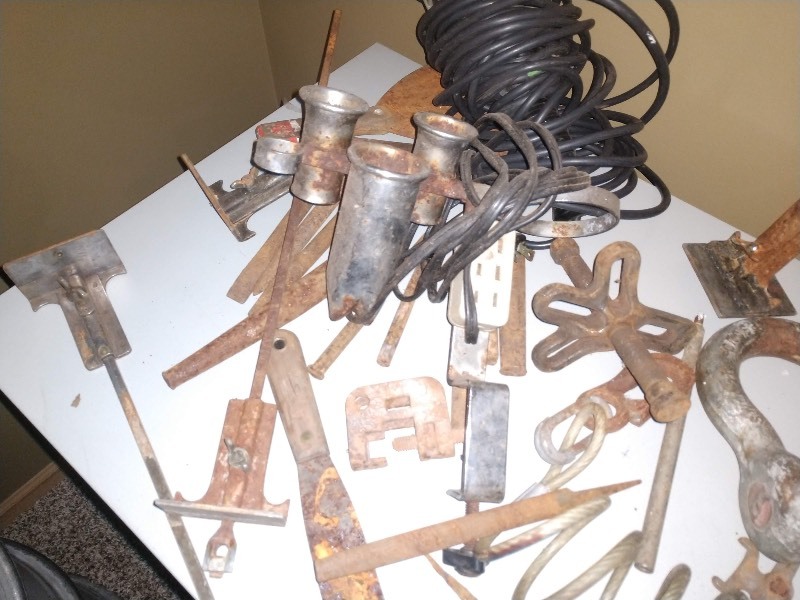 lot 8 image: Temporary Hanging Work Lights, Vintage Farm Hooks, Vintage Files, Level, Ruler, and Other Vintage Parts