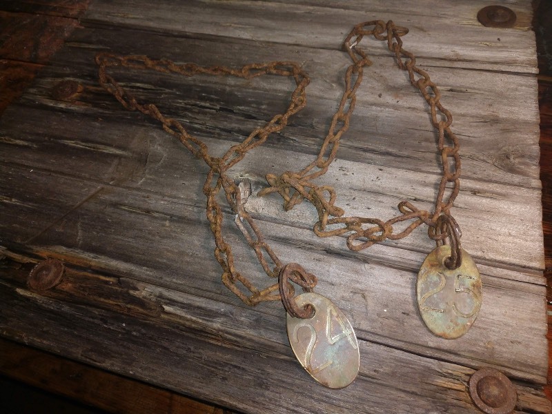 lot 36 image: Brass Cow Tags and Chain Double Sided Numbers 24 and 25