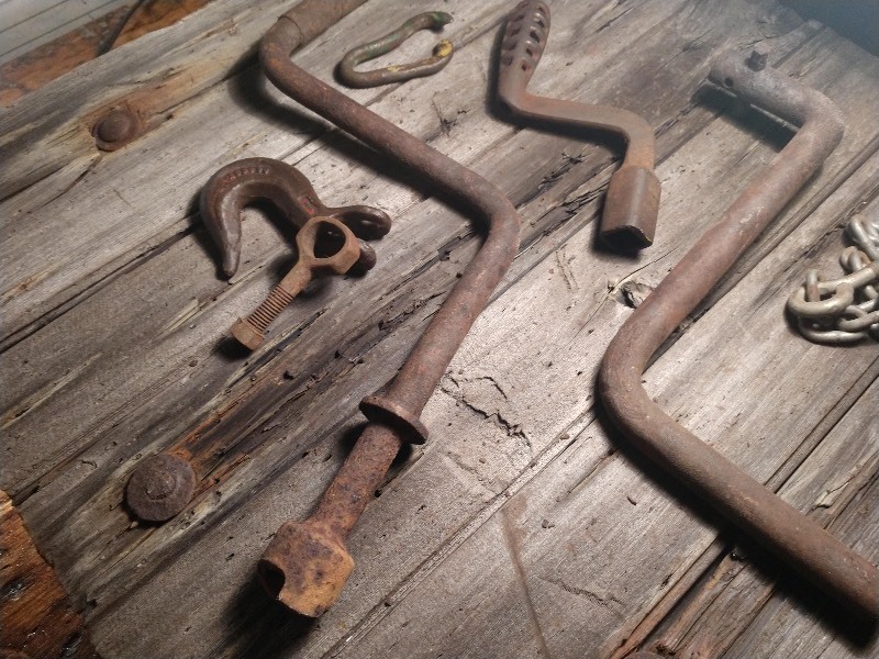 lot 39 image: Vintage Engine Car Cranks, Tractor Cranks and Farm Hooks