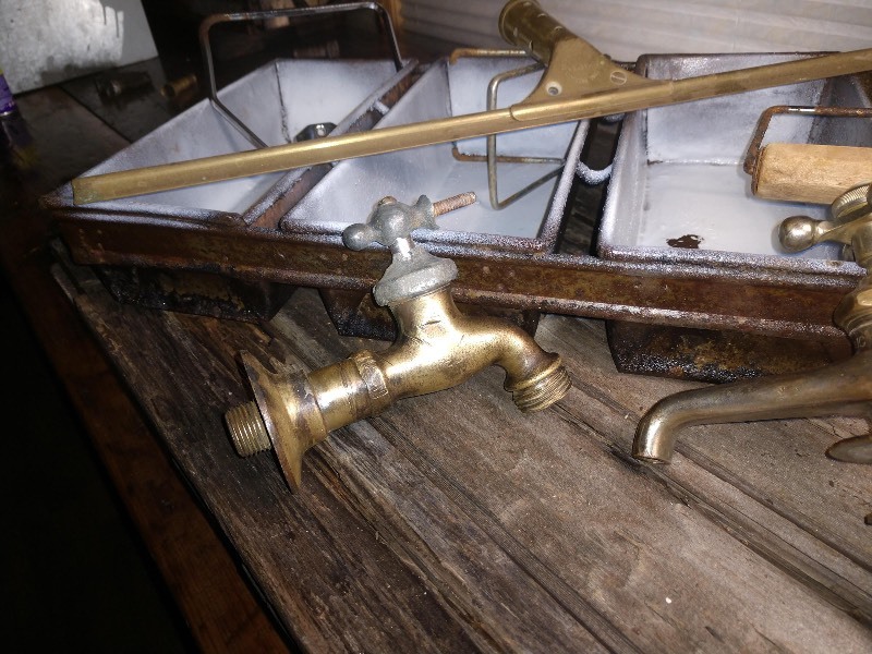lot 43 image: Toilet Paper Dispenser, Republic Faucet, Squeegee, Vintage Rustic Bread Loaf Pan