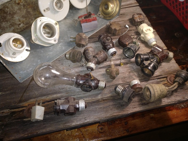 lot 45 image: Antique Electrical Parts, Porcelain Light Bulb Sockets and Galvanized Tin Bin