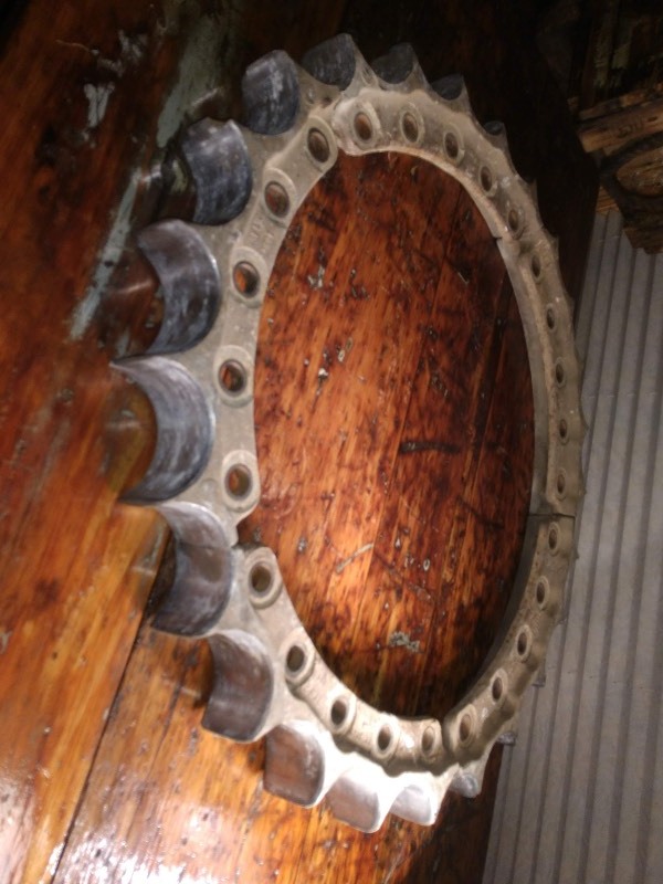 lot 87 image: Antique Industrial Sprocket off John Deere Bulldozer