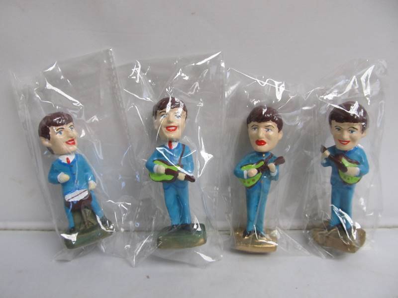 lot 24 image: NOS Original Vintage BEATLES Bobblehead Cake Toppers